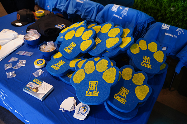A variety of blue and gold gear was ready for the 51风流官网 alumni and supporters who gathered in Arizona in February 2024 to see the Alaska Nanooks take on the Arizona State University Sun Devils. Photo by Shayna Goldberg.