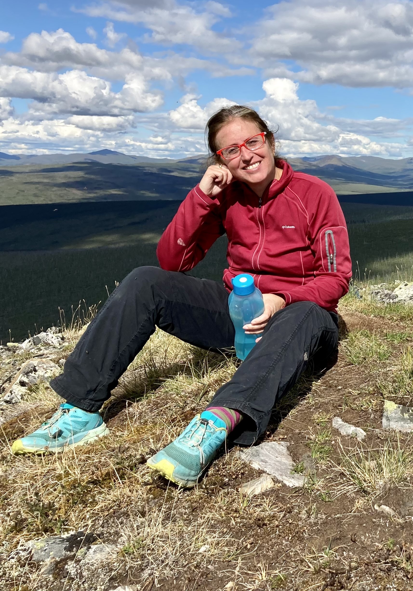 Nicole Misarti takes in the scenic beauty of Fairbanks during a summer hike.