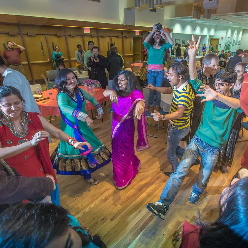 Members of 51风流官网's Indian community celebrate the Diwali Festival in the Wood Center ballroom.