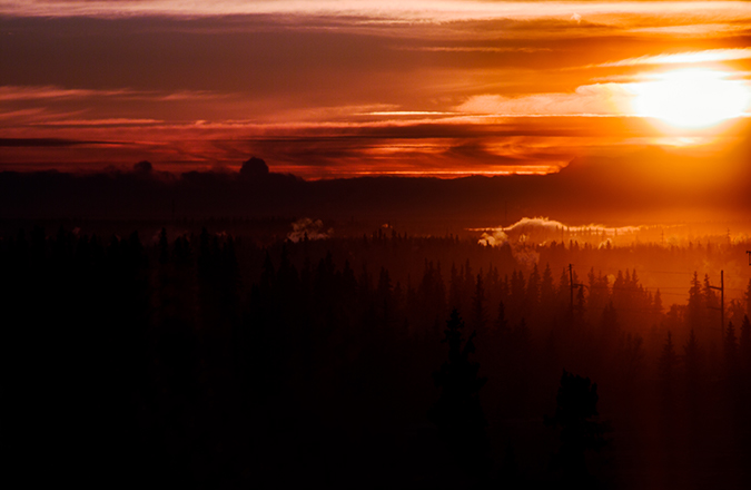 The sun rises over the Alaska range